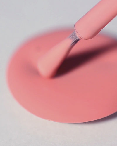 peachy pink nail polish swirl