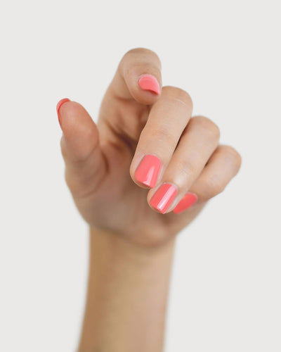 Grapefruit Pink nail polish swatch on fair Skin tone by Sienna Byron Bay